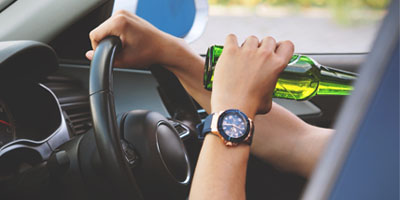 Person drinking whilst driving